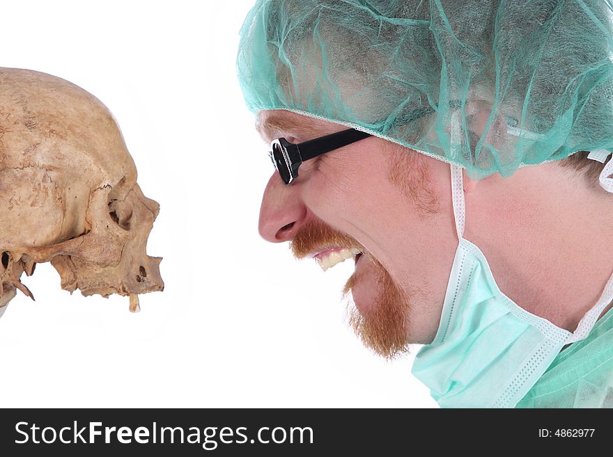 Details surgeon with skull on white background