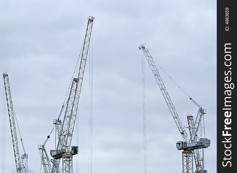 Two building cranes in steel. Two building cranes in steel
