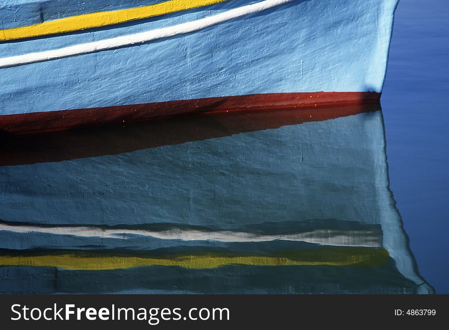 Reflection Of A Boat