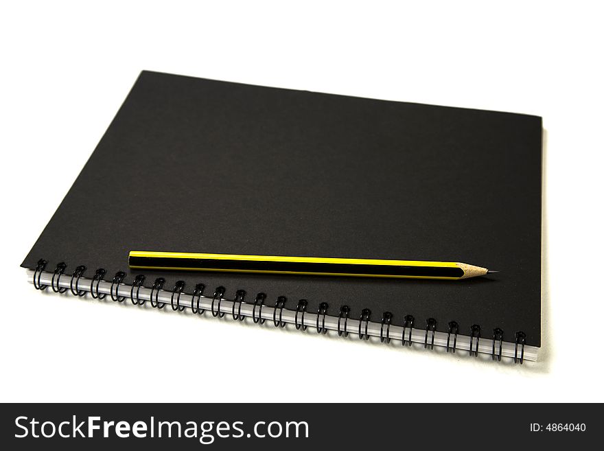Spiral Notepad and Pen isolated on White