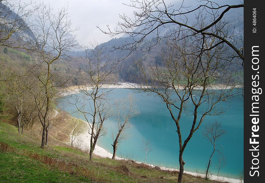 A gem of water in a lonely place: the Tenno's lake in Trentino Alto Adige. A gem of water in a lonely place: the Tenno's lake in Trentino Alto Adige