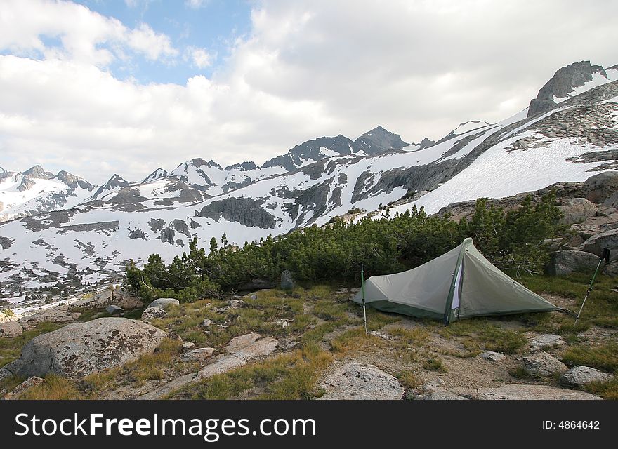 Hiker's camp in Sierra Nevada Mountains, along the John Muir Trail, near Donahue Pass, Yosemite National Park. Hiker's camp in Sierra Nevada Mountains, along the John Muir Trail, near Donahue Pass, Yosemite National Park.