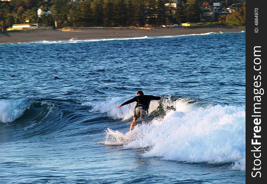 Boy surfing in Australian coast. Boy surfing in Australian coast