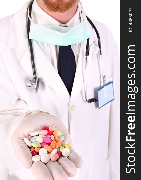 Doctor with tablets on white background