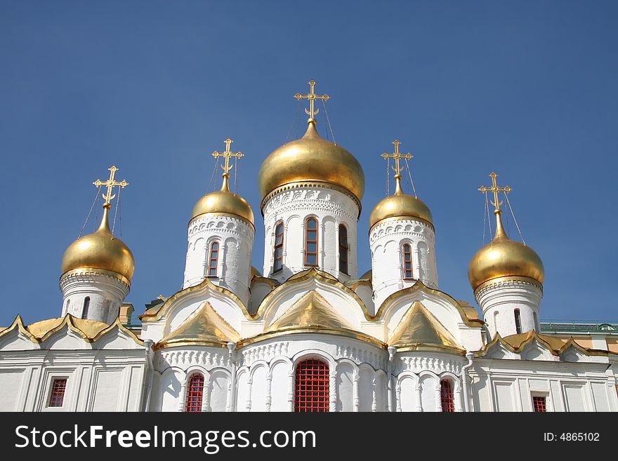 Golden domes of a church in the Kremlin, Moscow. Golden domes of a church in the Kremlin, Moscow