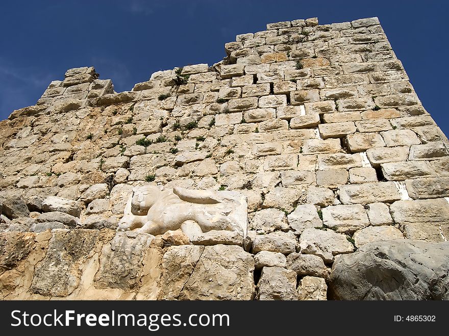 Walls of the crusader castle of Nimrod, northern Israel. With a toothy looking lion, center bottom. Walls of the crusader castle of Nimrod, northern Israel. With a toothy looking lion, center bottom.