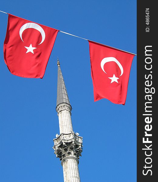 Turkish flag and a minaret in Istanbul