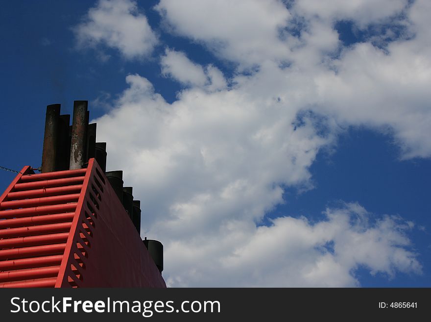 A big red chimney of ship