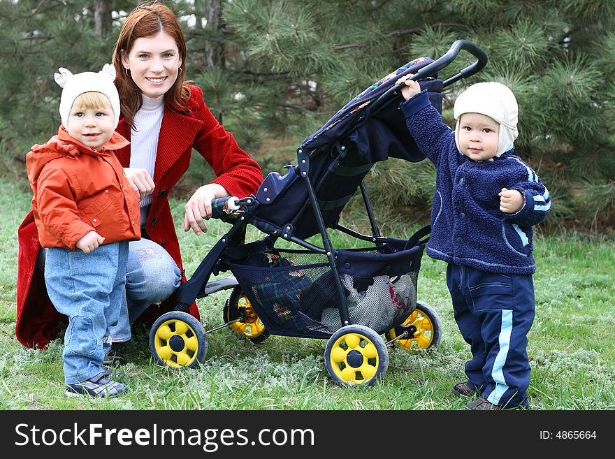 Young mum with two little boys on walk. Young mum with two little boys on walk