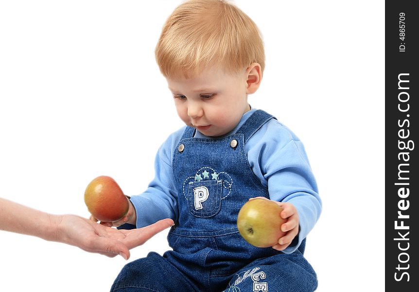 The small beautiful boy with two apples. The small beautiful boy with two apples