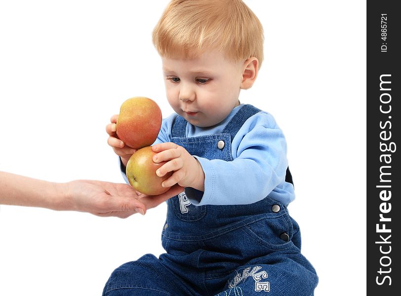 The small beautiful boy with two apples. The small beautiful boy with two apples