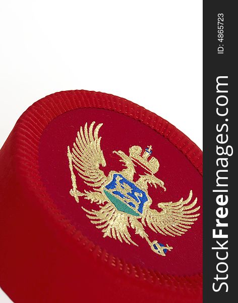 Traditional red montenegrin cap on white background. Traditional red montenegrin cap on white background