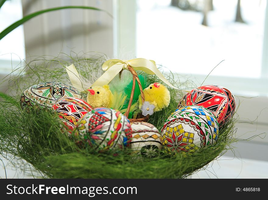 Hand painted Easter eggs in basket