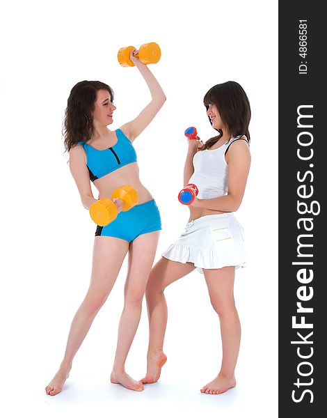 Girls practicing fitness on white background