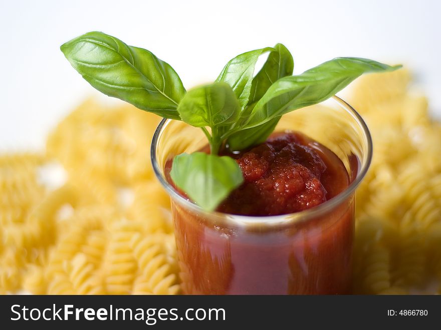 Fusilli pasta with tomato sauce and basil. Fusilli pasta with tomato sauce and basil