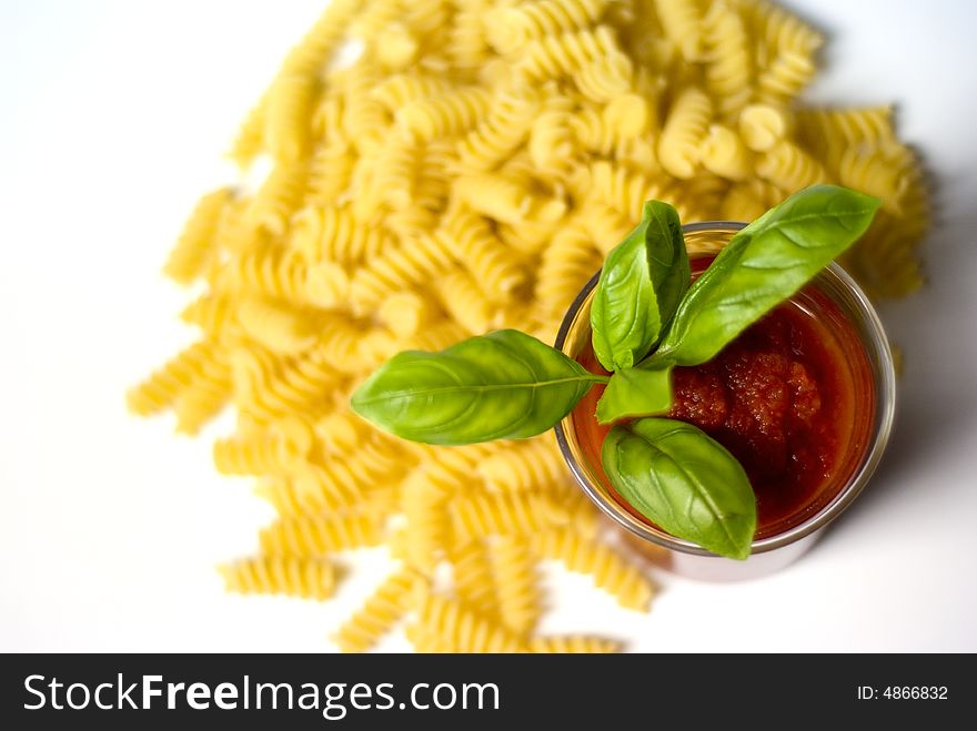 Fusilli pasta with tomato sauce and basil. Fusilli pasta with tomato sauce and basil