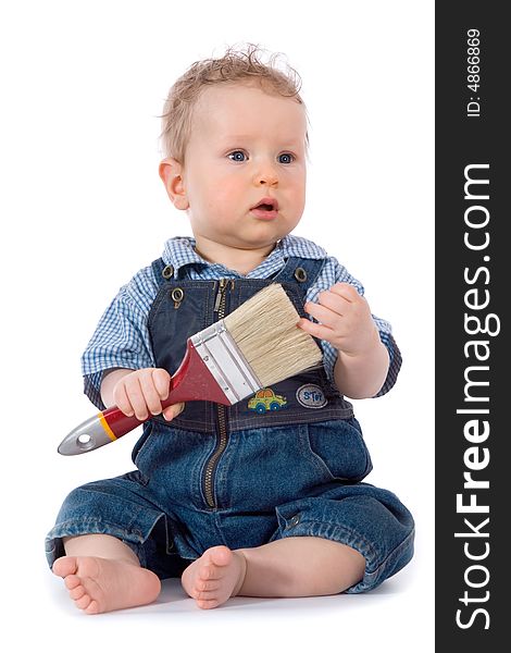 Beautiful baby with paint brush on white