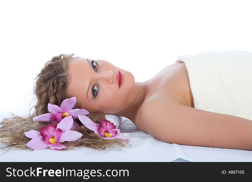 Attractive woman getting spa treatment on white