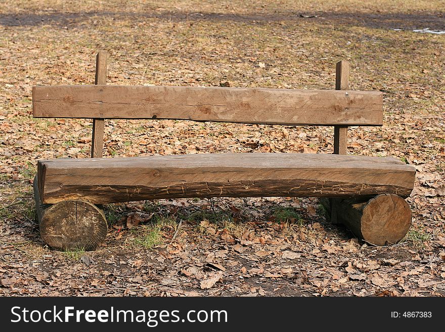 A wooden  bench in the park