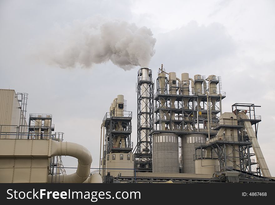 Reffinery chimneys polluting the air. Reffinery chimneys polluting the air