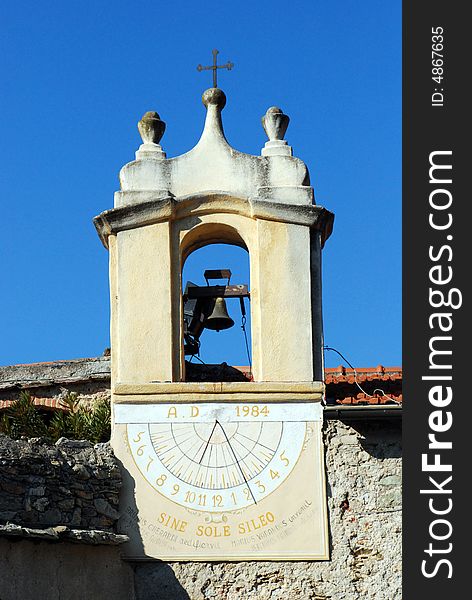 Little bell tower of a church in Liguria, Italy. Little bell tower of a church in Liguria, Italy