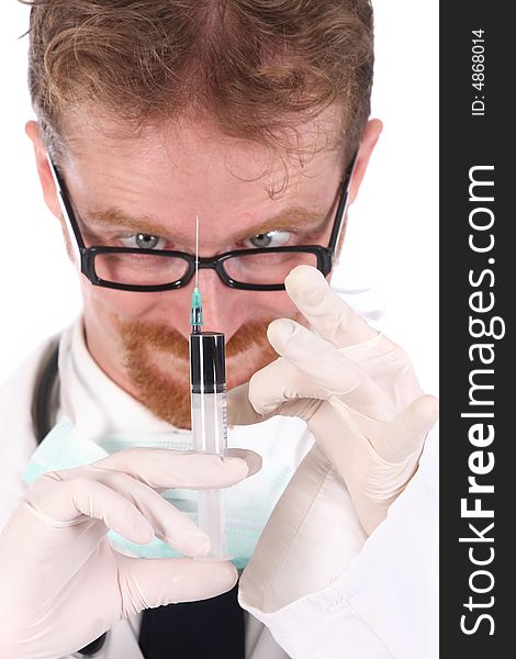 Doctor with injection on white background