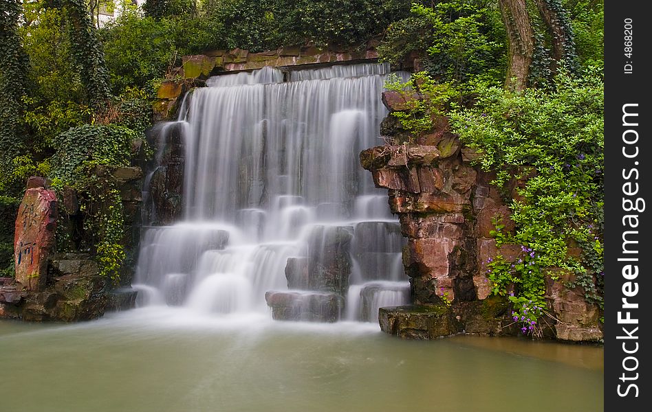 Waterfall of Yuantouzhu garden in spring. Waterfall of Yuantouzhu garden in spring