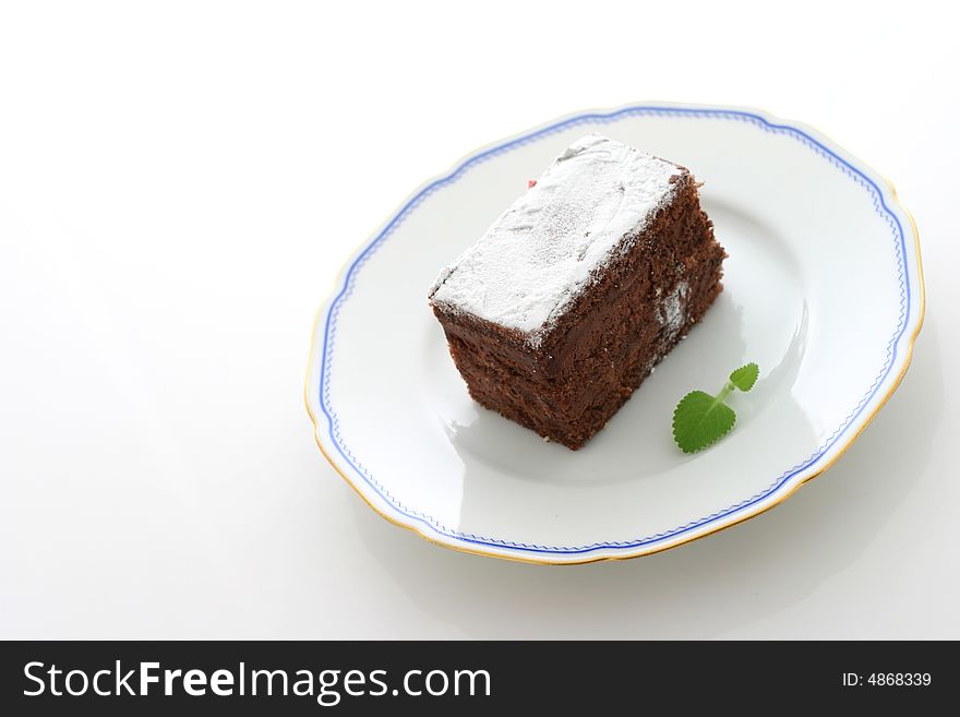 Chocolate cake on white background