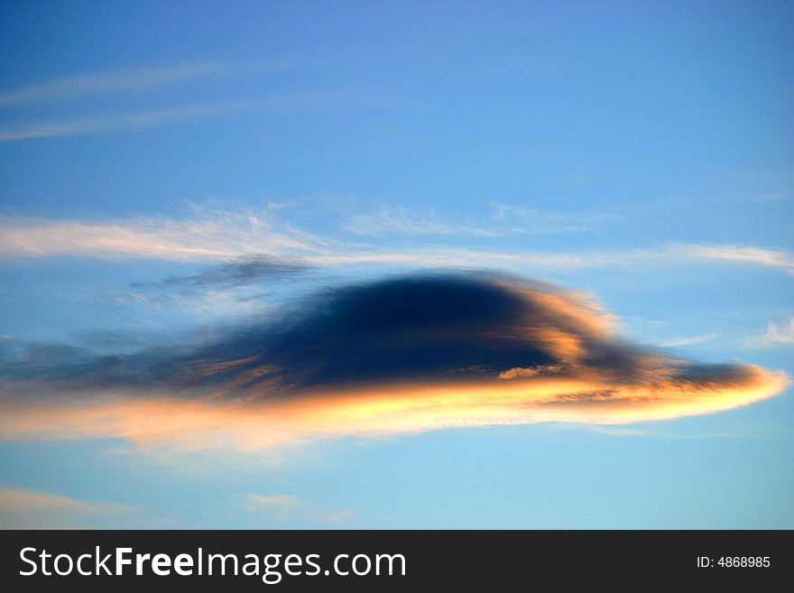 Photo of a cloud which has the appearance of a dolphin. Photo of a cloud which has the appearance of a dolphin