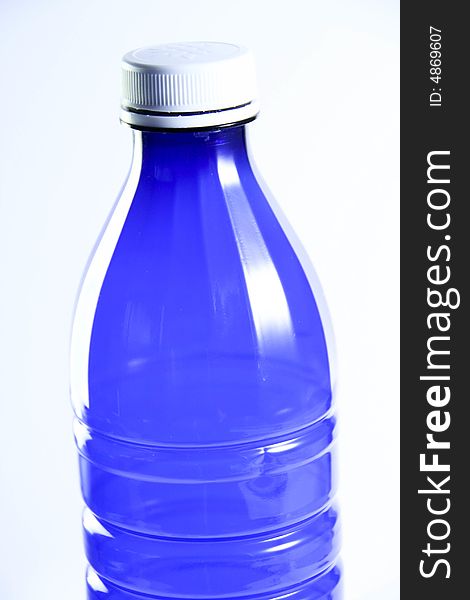 A blue bottle on a background
