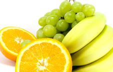 Grapes, Bananas And Two Halves Of Orange Stock Image Grapes, Bananas And Two Halves Of Orange Stock Image