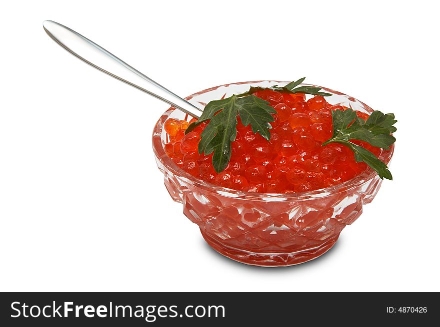 Crystal dish with red caviar on a white background