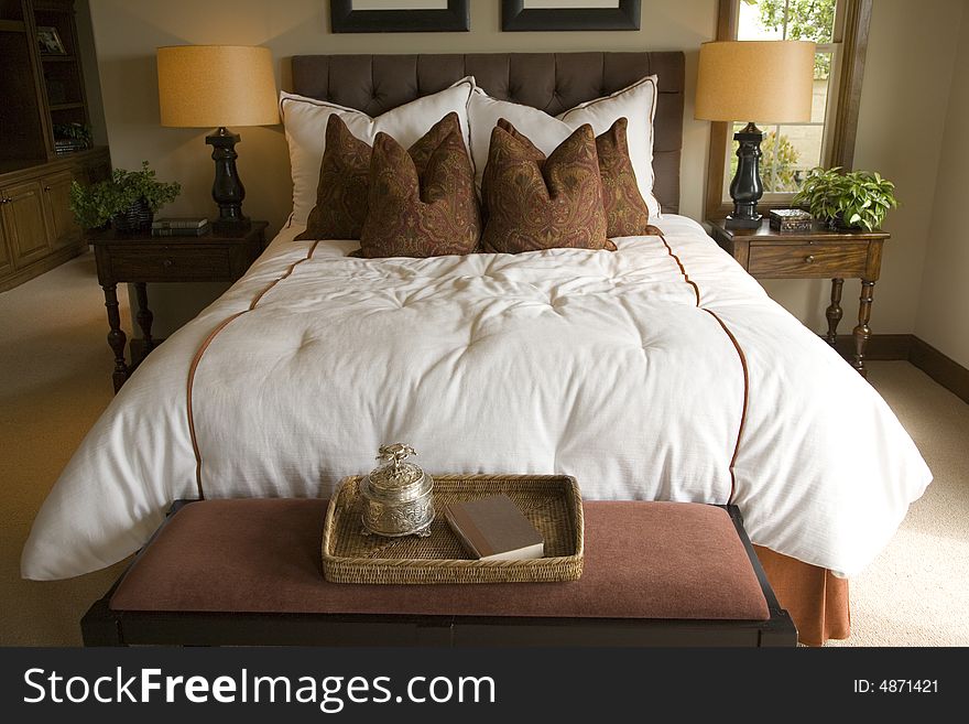Luxury home bedroom with stylish furniture and decor. Luxury home bedroom with stylish furniture and decor.