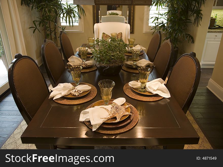 Dining table with modern tableware. Dining table with modern tableware.