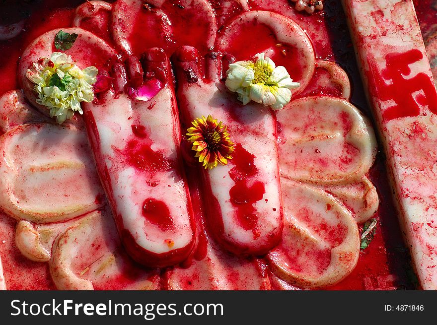 India, Udaipur: Holy feet; the feet of the buddha; a holy representation in the main entrance of a temple