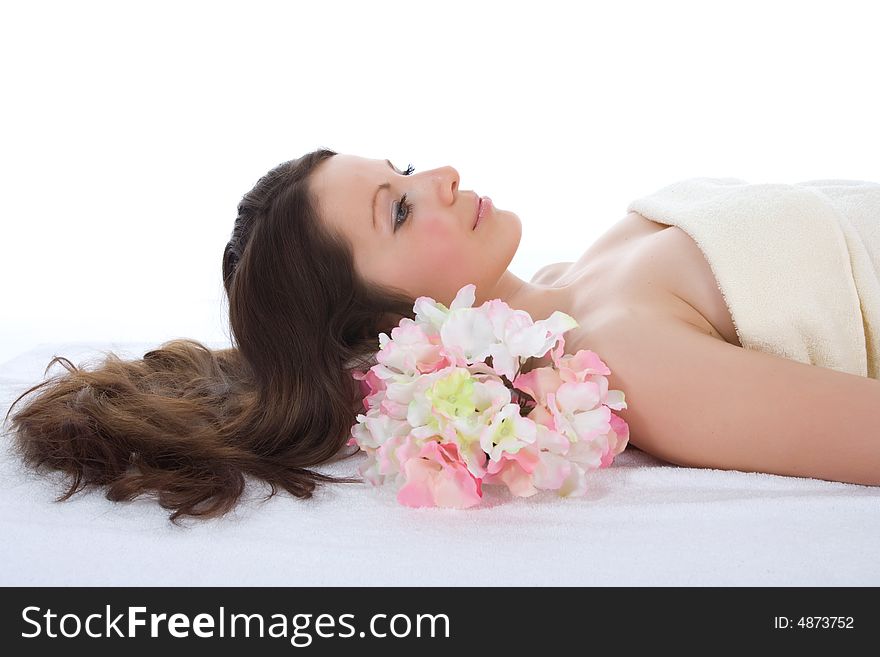 Attractive woman getting spa treatment on white