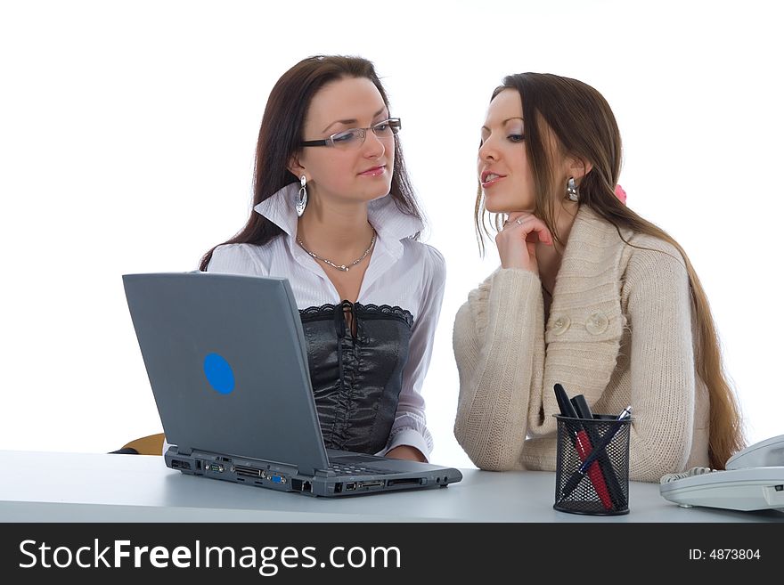 Two business woman work with laptop