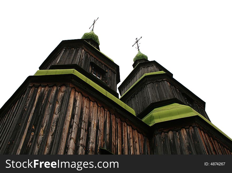 Old traditional rural ukrainian wooden three tiers church. Old traditional rural ukrainian wooden three tiers church