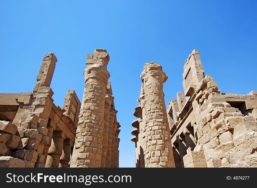 Ruins of egyptian temple in luxor on the blue sky. Ruins of egyptian temple in luxor on the blue sky