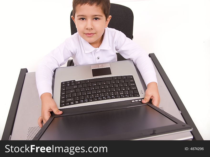 Portrait of cute caucasian boy with laptop over white. Portrait of cute caucasian boy with laptop over white