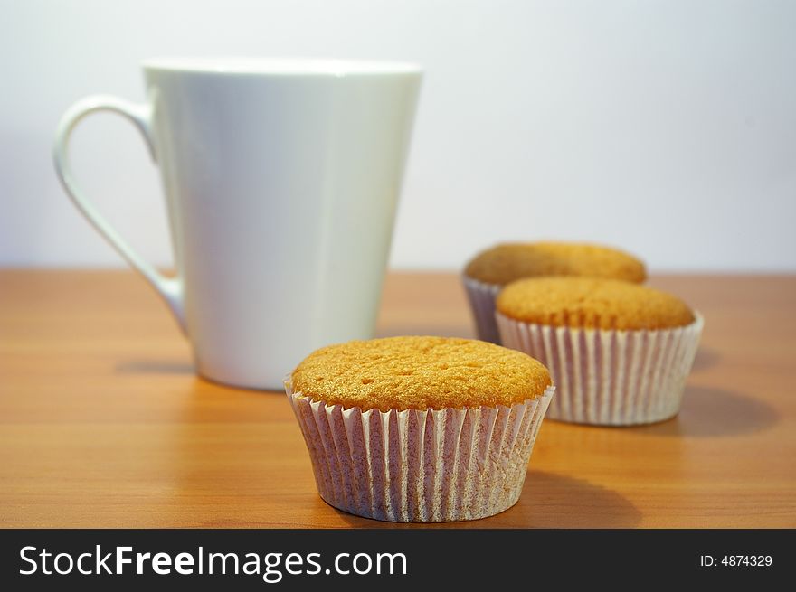 Cakes and the cup of tea with the lemon. Cakes and the cup of tea with the lemon