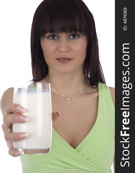 Woman with a glass of milk against a white background