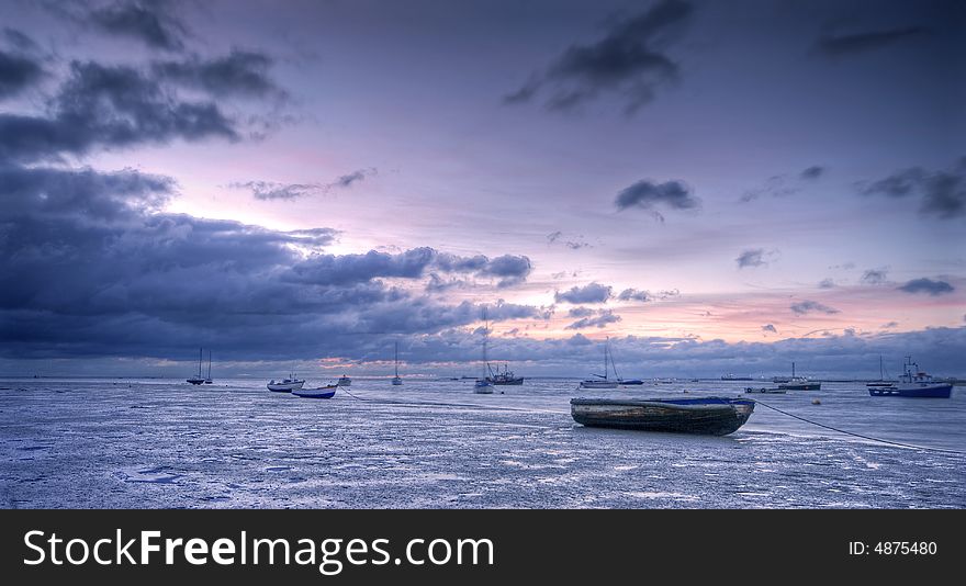 Sunrise and muddy beach