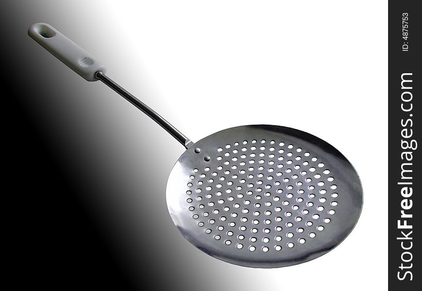 Kitchen tool, against a black and white background. Kitchen tool, against a black and white background