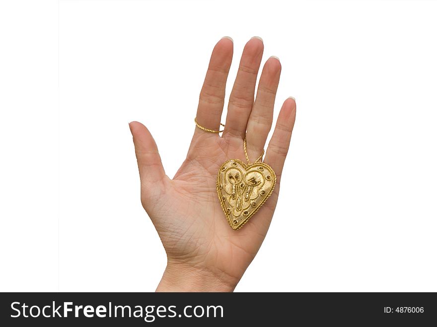 little gold  heart on the woman hand