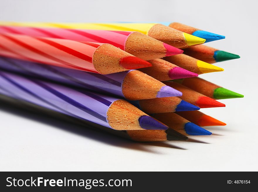 A set of color pencils with white background.