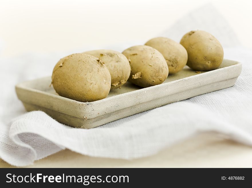 Five Raw Potatoes