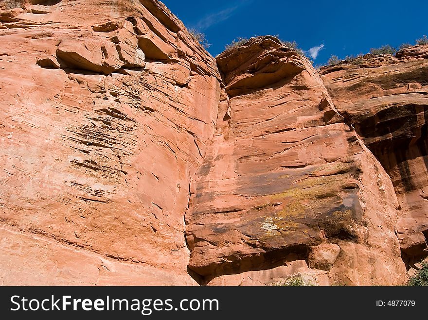 Sandstone cliffs against a really blue sky - Ayres State Park, Wyoming.