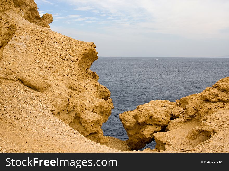 Mountain on a background of the sea. Mountain on a background of the sea