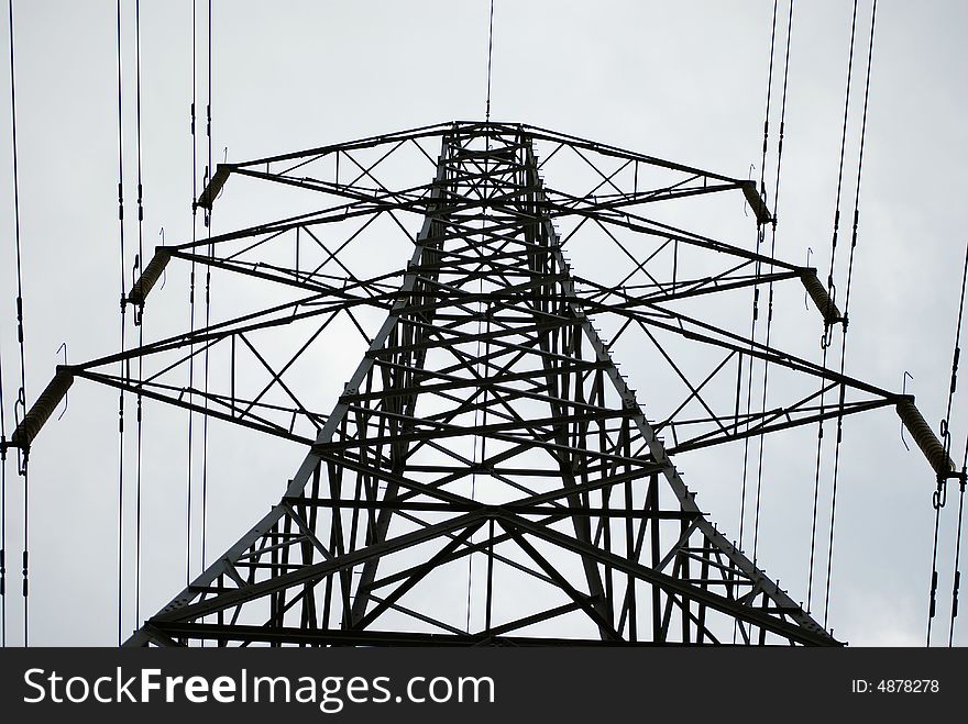 A view looking up at the height of a powerful pylon. A view looking up at the height of a powerful pylon